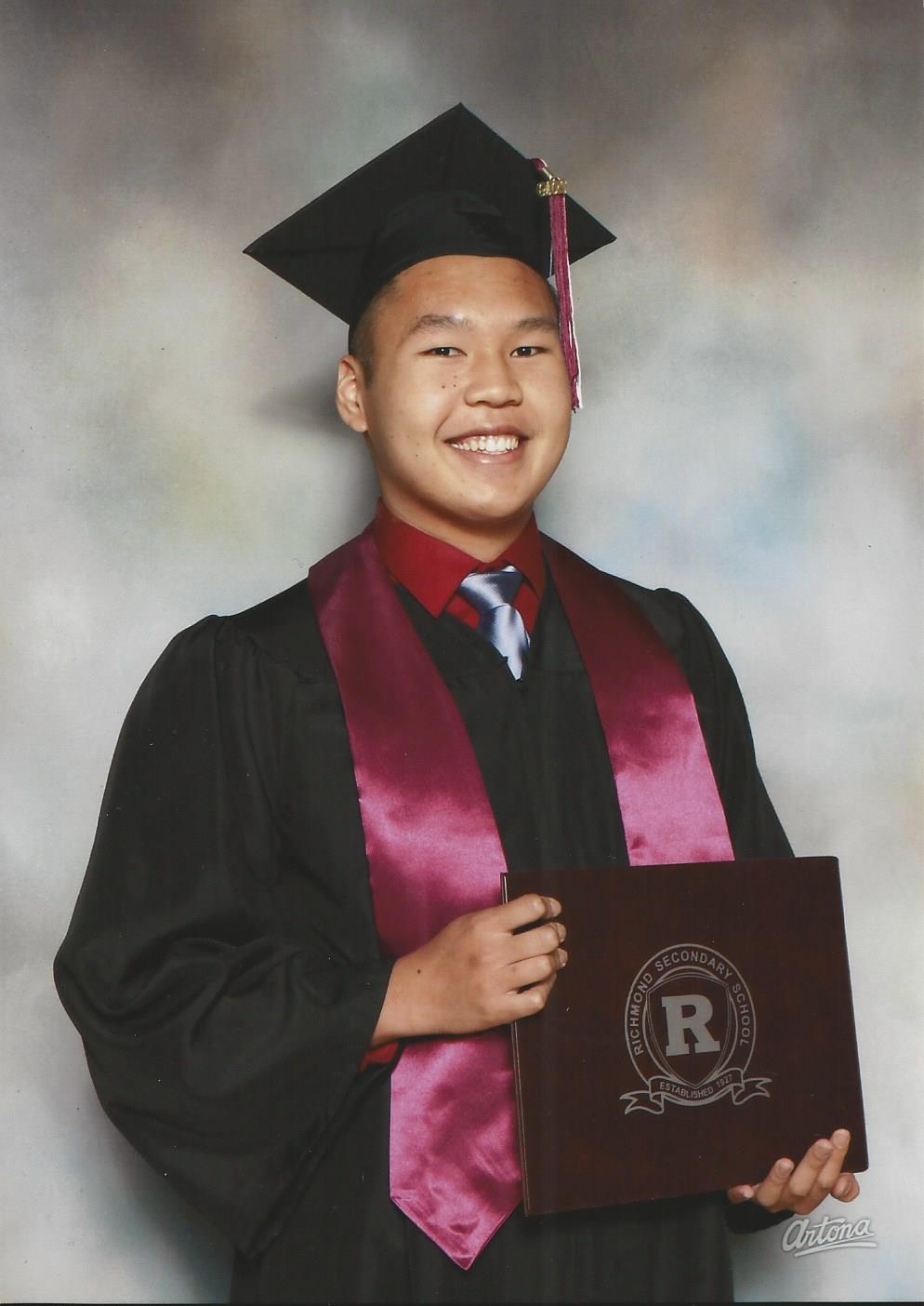A picture of Andre graduating